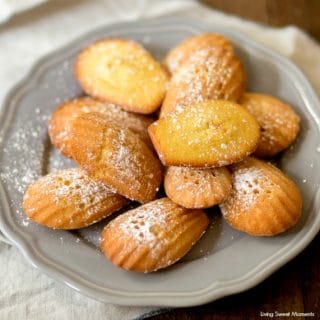 These Classic Lemon Madeleines cookies are soft, buttery, & delicious. Enjoy delicate French cookies served on a platter