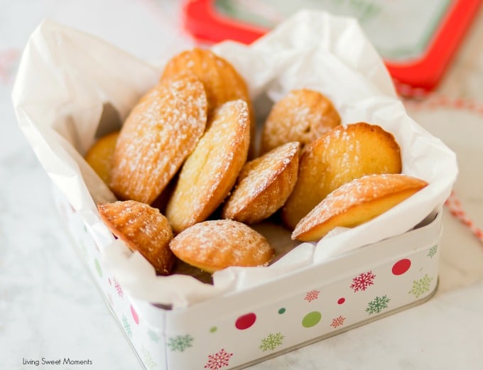 These Classic Lemon Madeleines cookies are placed on a cookie tin to give out as edible DIY Gifts