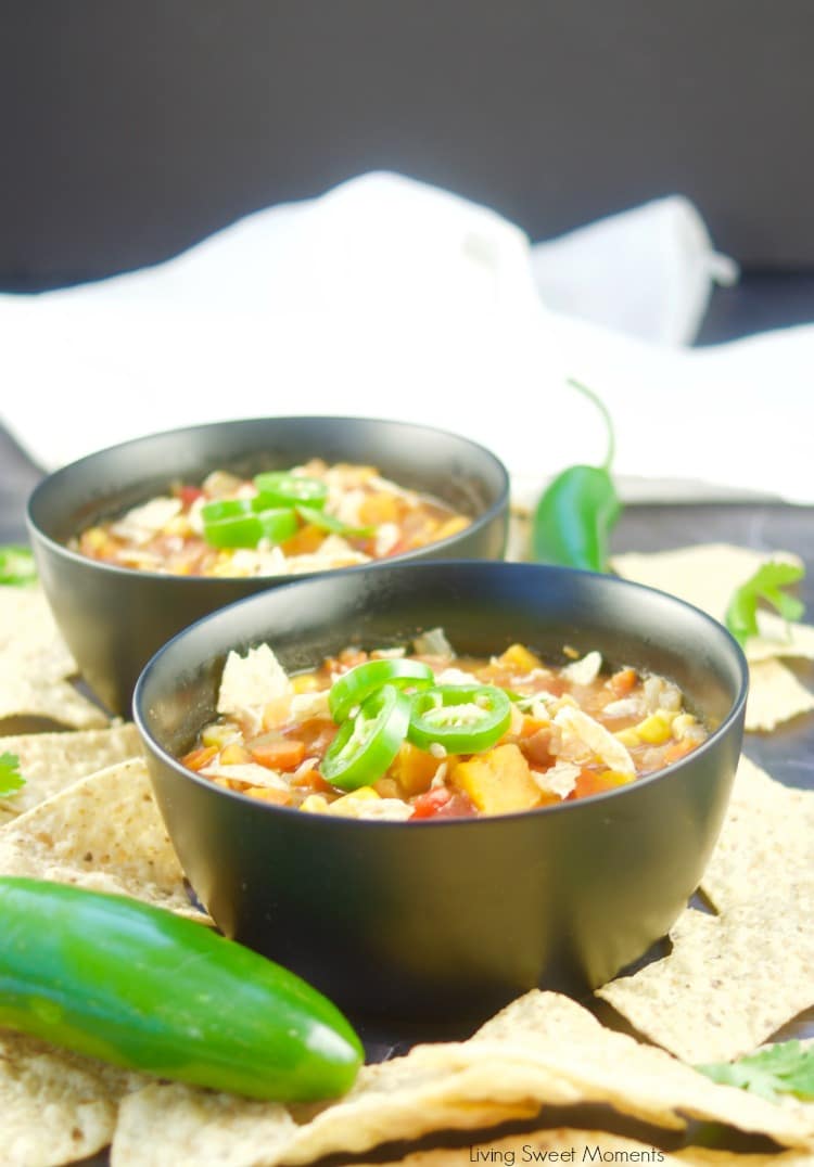 This quick and easy Vegan Instant Pot Sweet Potato Chili recipe is ready in 20 minutes shown in 2 black bowls