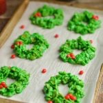 These easy and delicious Christmas Wreath Cookies require no baking & few ingredients. Perfect to make with kids. Give them out as gifts or for dessert.