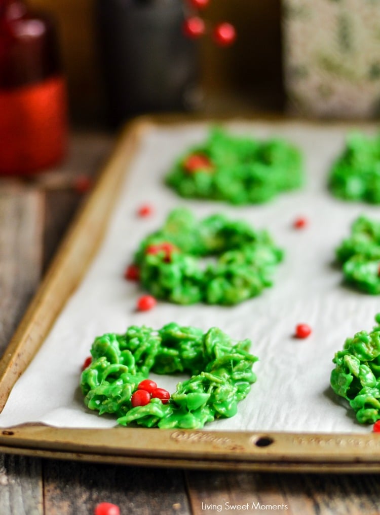 These easy and delicious Christmas Wreath Cookies require no baking & few ingredients. Perfect to make with kids. Give them out as gifts or for dessert.