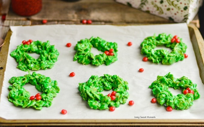 These easy and delicious Christmas Wreath Cookies require no baking & few ingredients. Perfect to make with kids. Give them out as gifts or for dessert. 