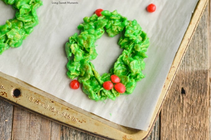 These easy and delicious Christmas Wreath Cookies require no baking & few ingredients. Perfect to make with kids. Give them out as gifts or for dessert.