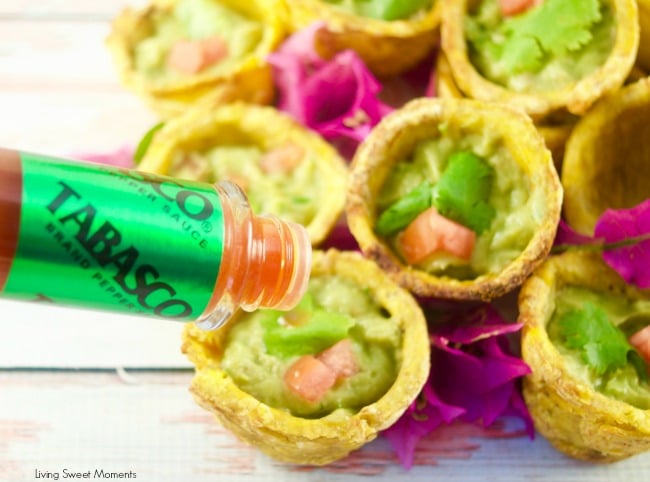 Give your parties a latin twist and enjoy crispy Plantain Cups filled with spicy guacamole. Closeup of Tabasco sauce