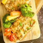 Enjoy this easy honey mustard sheet pan salmon with broccoli and colorful vegetables. Ready in 25 minutes and perfect families