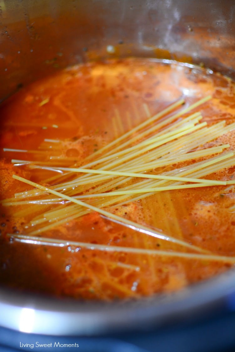 This quick Instant Pot Pasta Recipe is made with sausage and spinach. How to make spaghetti in the instant pot