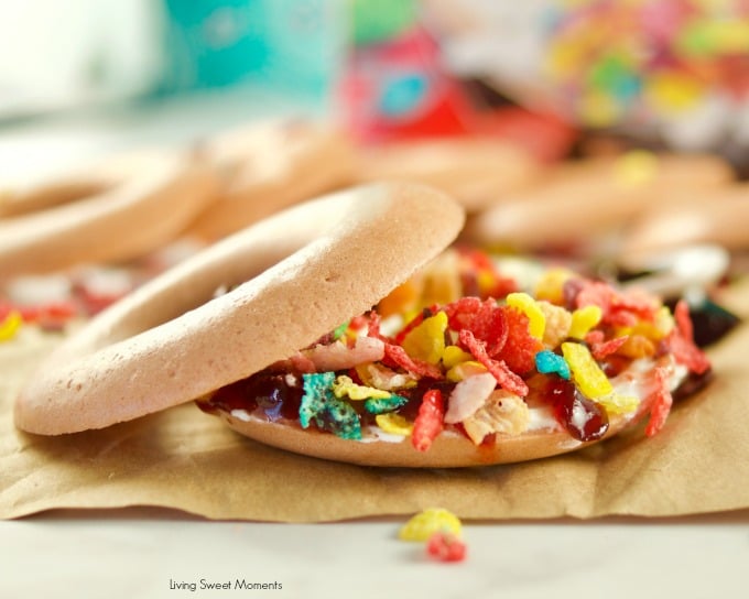 Yummy crunchy Fruity Pebbles Rice Cakes Sandwiches an easy to make snack that kids love. A closeup of the sandwich with cereal 
