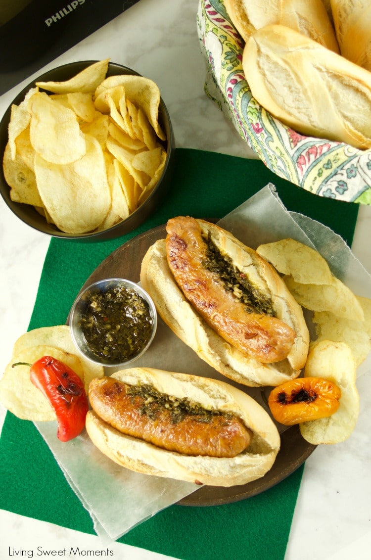 Juicy and delicious grilled Choripan, aka Chorizo Hot Dogs served with chimichurri sauce. The perfect food for parties and celebrations