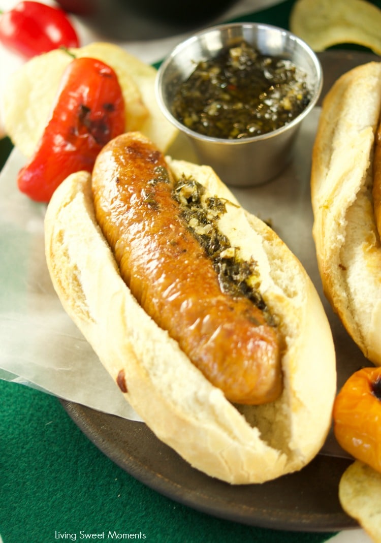 Juicy and delicious grilled Choripan, aka Chorizo Hot Dogs served with chimichurri sauce. The perfect food for parties and celebrations