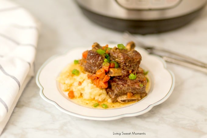 This melt in your mouth tender Instant Pot Short Ribs recipe is super easy to make and ready in less than hour. The perfect comfort food recipe to prepare for dinner any day of the week.