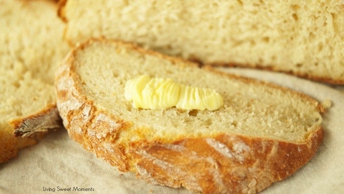 This crusty and delicious Instant Pot Sourdough Bread slice with butter