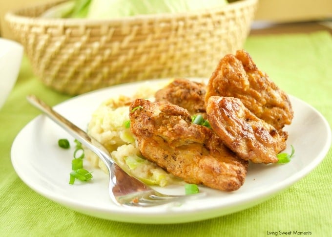 Celebrate St. Patty's day with a hefty bowl of Irish Colcannon Potatoes served with grilled chicken on a white plate 