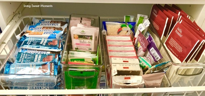 Here are some easy Pantry Organization Ideas use of small containers to store tea bags, small packets, and protein bars