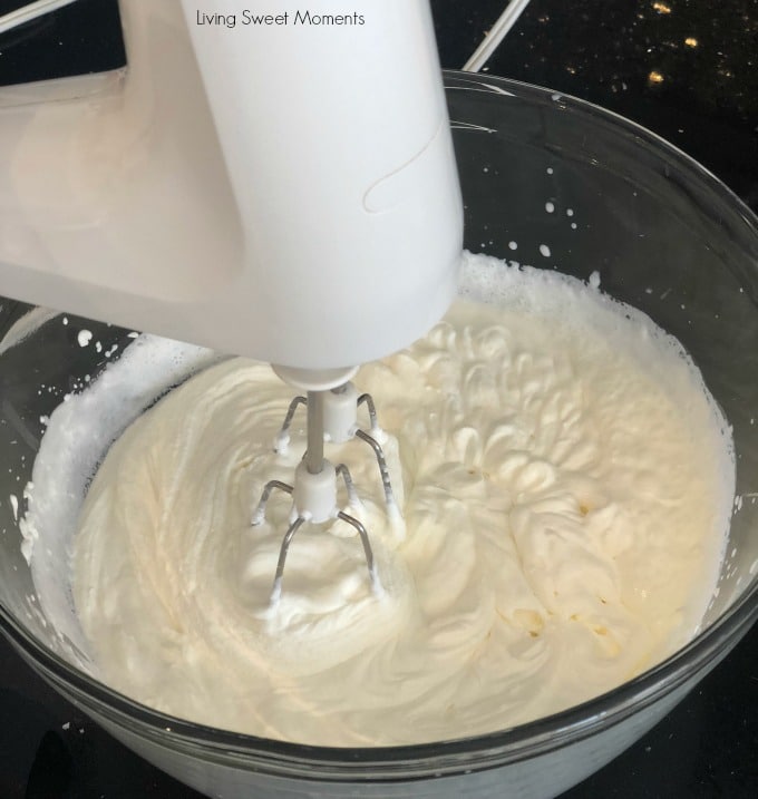 Only 2 ingredients needed for this creamy homemade mascarpone cheese - shows a mixer whipping cream