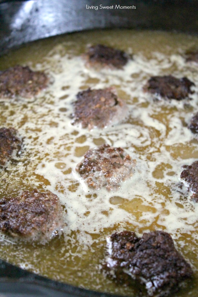 One Pot Greek Meatballs cooking in the stock