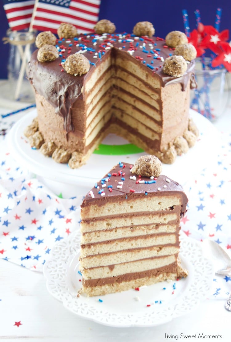 This colossal Peanut Butter Chocolate Cake recipe is made from scratch and is garnished with peanut butter truffles. Showing the cake and a slice