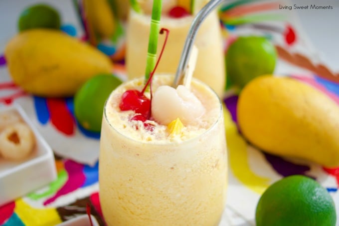 These refreshing Mango Lychee Wine Slushies have a touch of ginger . Closeup of glass
