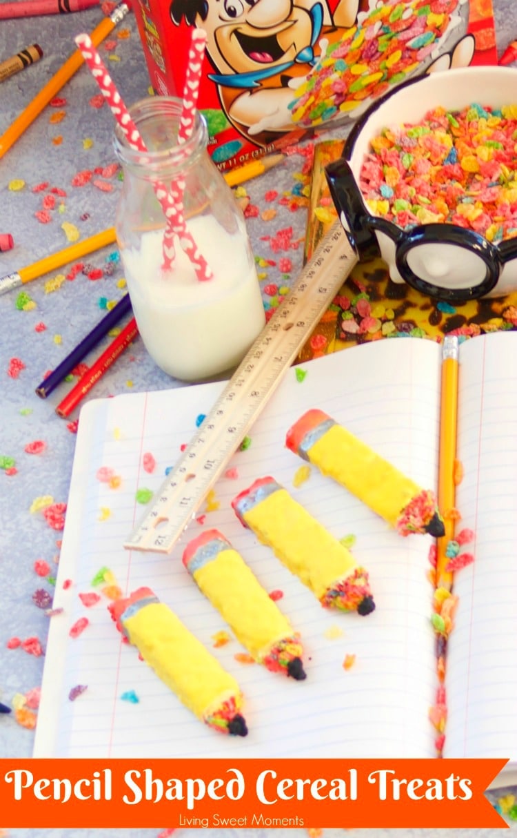 Shown here Pencil Shaped Cereal Treats made with Fruity Pebbles on a notebook with a ruler