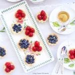 Perfect for any occasion, these elegant Mini Berry Tarts are made with a buttery crust, vanilla pastry cream and fresh berries on top