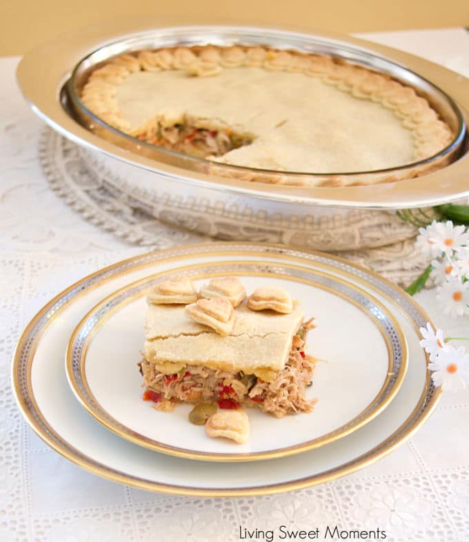 This savory shortcrust chicken pie (Polvorosa de Pollo) is made Venezuelan style by filling it with yummy shredded chicken, olives, raisins, and capers.