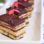 My favorite French dessert. This scrumptious classic Opera Cake recipe is composed of 7 layers of cake, chocolate, and coffee flavored french buttercream.