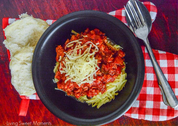 Come home to a delicious and comforting meal. This hearty Slow Cooker Sausage Puttanesca is served with zoodles. The perfect low-carb weeknight dinner idea.