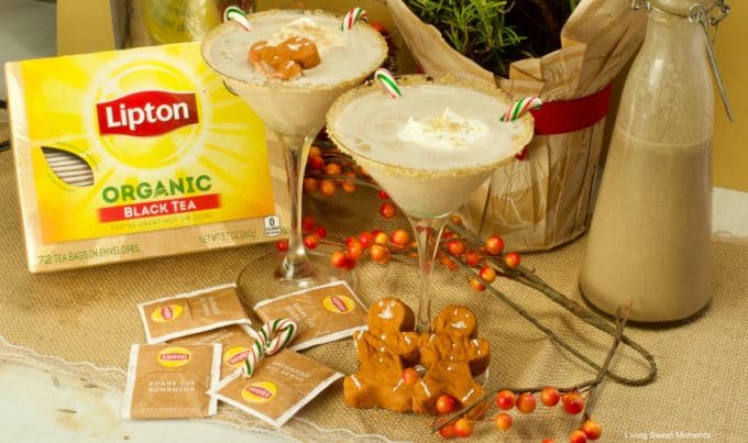 Get in the Holiday spirit with this creamy and flavorful Chai Tea Eggnog Cocktail served on a martini glass and garnished with fresh whipped cream.