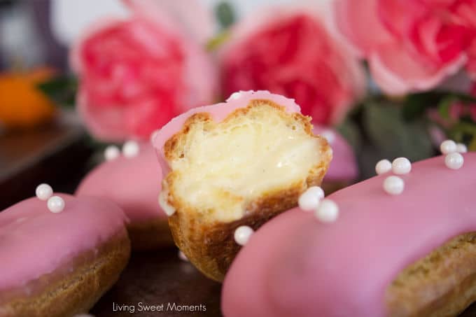 These delicate vanilla eclairs features a crunchy pate au choux filled homemade vanilla pastry cream and topped with a sweet glaze. A classic french pastry.