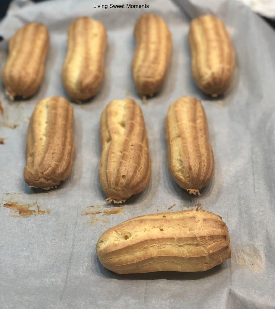 These delicate vanilla eclairs features a crunchy pate au choux filled homemade vanilla pastry cream and topped with a sweet glaze. A classic french pastry.