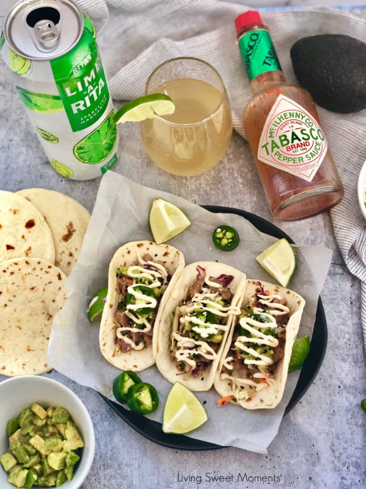 Delight your friends with these delicious Asian Style Tuna Tacos. Marinated ahi tuna is served over an asian slaw, avocados, and covered with spicy mayo. 