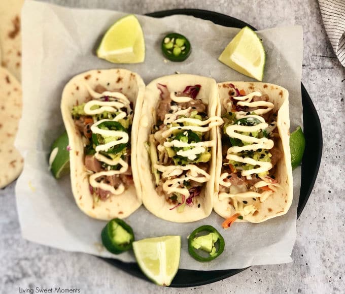 Delight your friends with these delicious Asian Style Tuna Tacos. Marinated ahi tuna is served over an asian slaw, avocados, and covered with spicy mayo.