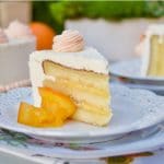 This amazing Succulent Orange Curd Cake consists of 3 layers of moist orange cake filled with orange curd and topped with Swiss vanilla buttercream.