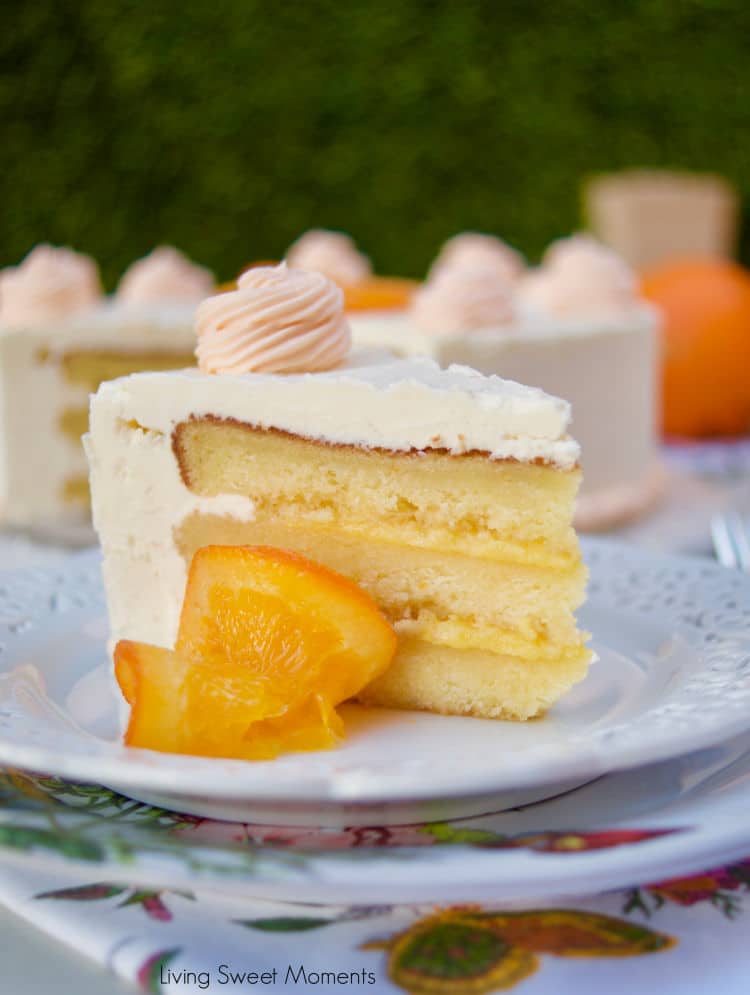 This amazing Succulent Orange Curd Cake consists of 3 layers of moist orange cake filled with orange curd and topped with Swiss vanilla buttercream.