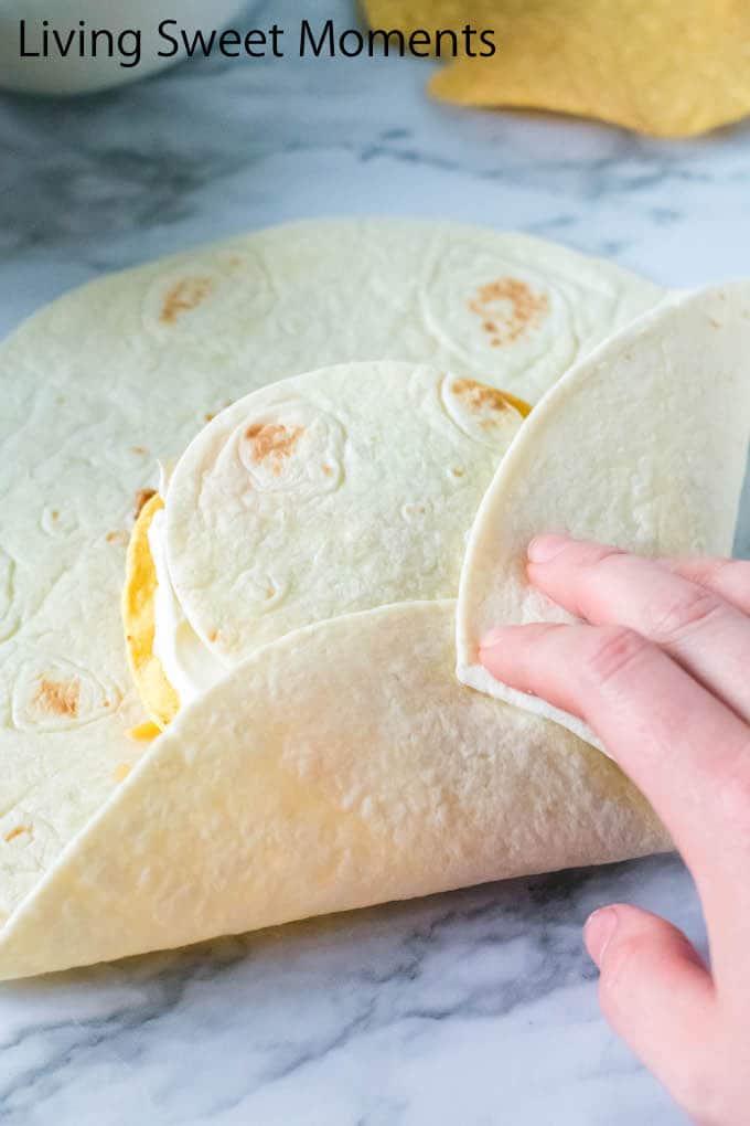 Skip the drive thru lane and enjoy a delicious meal at home. This Copycat Taco Bell Crunch Wrap recipe is easy to make, healthier and ready in no time.