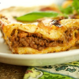 This Authentic Italian Lasagna Recipe made is by layering noodles with bolognese sauce, cheese, and bechamel. Delicious for dinner and celebrations.