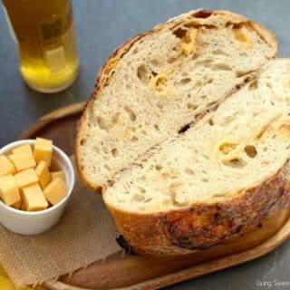 Bake this Beer Gouda Onion Sourdough Bread, a flavorful, advanced loaf with caramelized onions, gooey cheese, and beer for the perfect bite