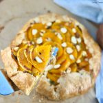 Butternut Squash Galette with caramelized onions, creamy goat cheese, and a flaky buttery crust. Perfect for fall gatherings and Thanksgiving!