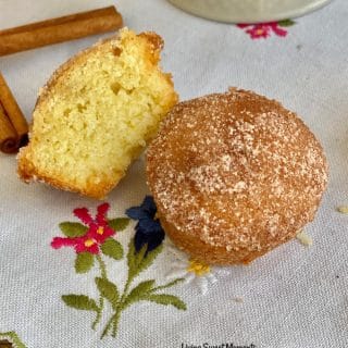 These delicate Cinnamon Sugar Mini Donut Muffins have a moist soft crumb with a crunchy cinnamon sugar topping. Perfect to serve with coffee or breakfast.