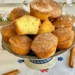 These delicate Cinnamon Sugar Mini Donut Muffins have a moist soft crumb with a crunchy cinnamon sugar topping. Perfect to serve with coffee or breakfast.