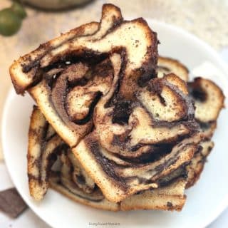 Bakery-style sourdough chocolate babka with buttery enriched dough, swirls of chocolate, timeline, variations, freezing tips & same-day bake