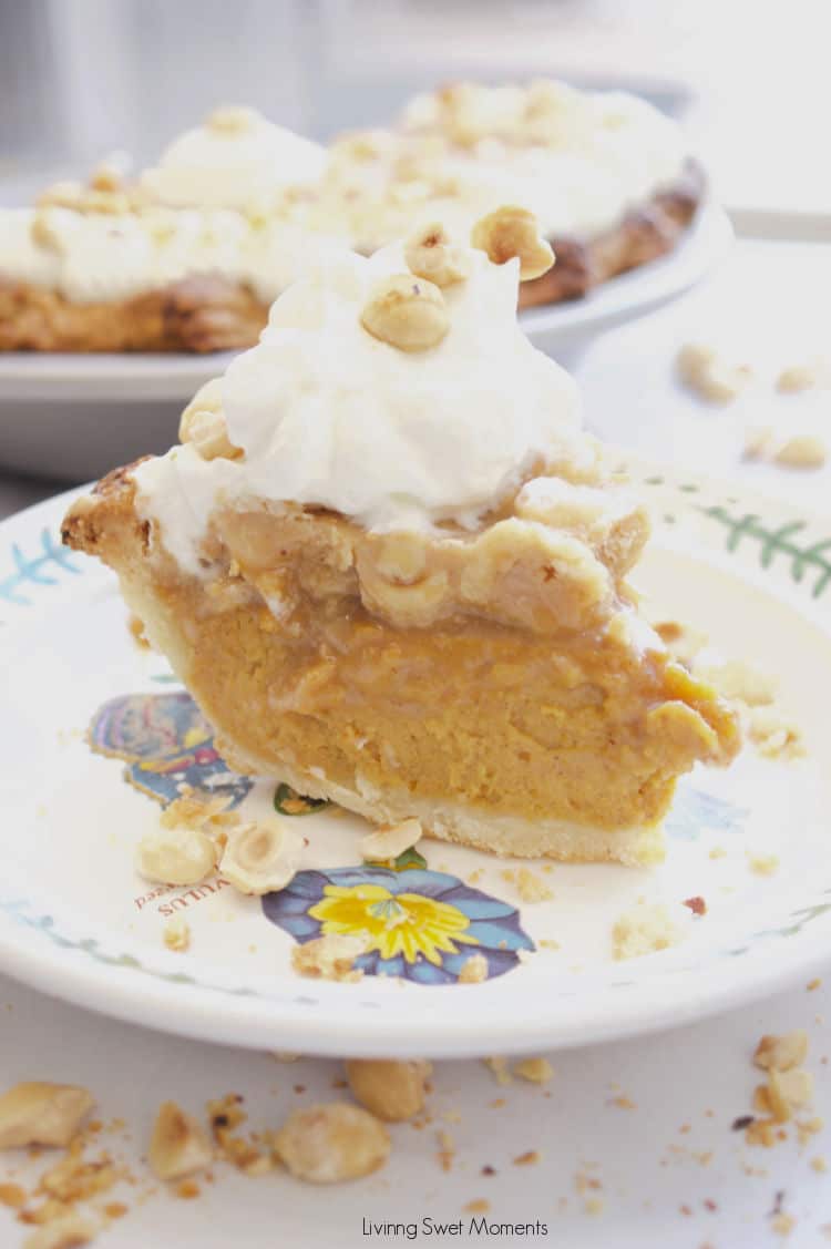 Elevate your Thanksgiving table with this delicious Hazelnut Praline Pumpkin Pie served on a flaky homemade crust 