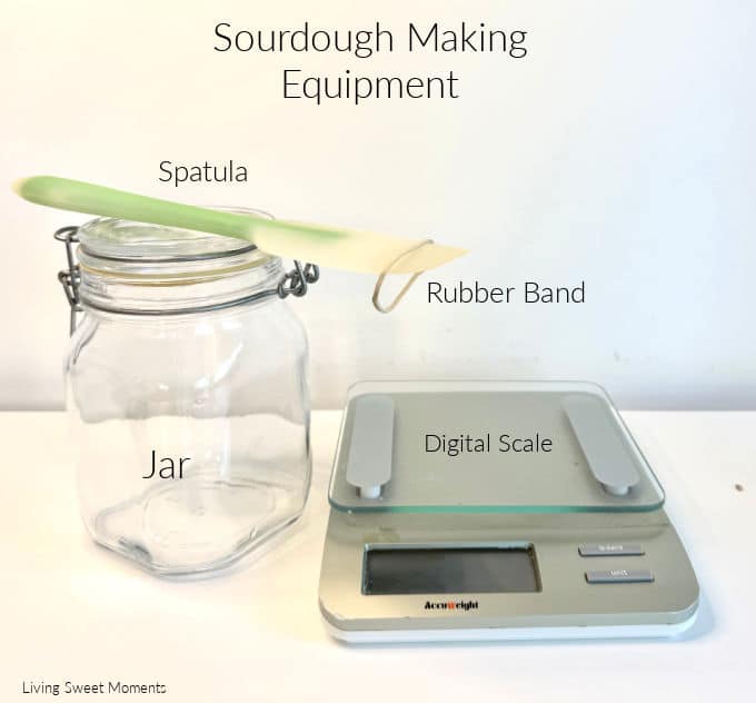 Sourdough starter tools on counter: jar, scale, spatula