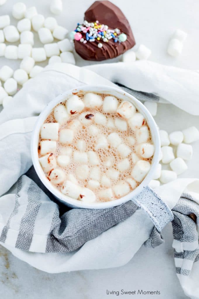 When you pour hot milk over these hot chocolate bombs, they melt and magically release the coffee, marshmallows, and cocoa hiding inside.