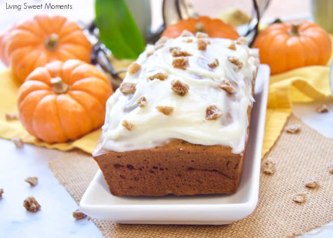 This delicious and moist pumpkin loaf recipe is topped with tangy cream cheese frosting and crystallized ginger pieces. It's perfect for breakfast, snack, or dessert! 