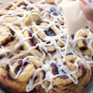 These fluffy Slow Cooker Cinnamon Rolls are made from scratch & baked right in the crockpot. Topped with a sweet vanilla icing. Ideal for breakfast & brunch