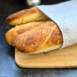 Crispy crust, airy crumb, and tangy flavor! This sourdough baguette recipe makes bakery-style bread at home with an easy overnight ferment