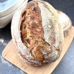 Golden, nutty sourdough country loaf with spelt, simple, cozy, and bakery worthy. Tips, timeline, & freezing guide for perfect homemade bread
