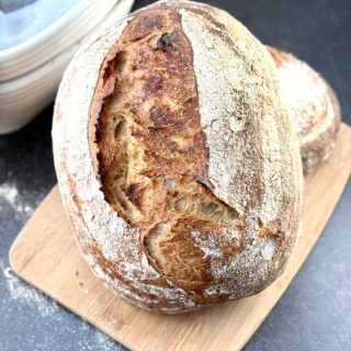 Golden, nutty sourdough country loaf with spelt, simple, cozy, and bakery worthy. Tips, timeline, & freezing guide for perfect homemade bread