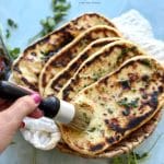 This sourdough discard naan recipe makes soft, tangy, and flavorful flatbreads. Quick & easy with skillet, grill, or oven methods.