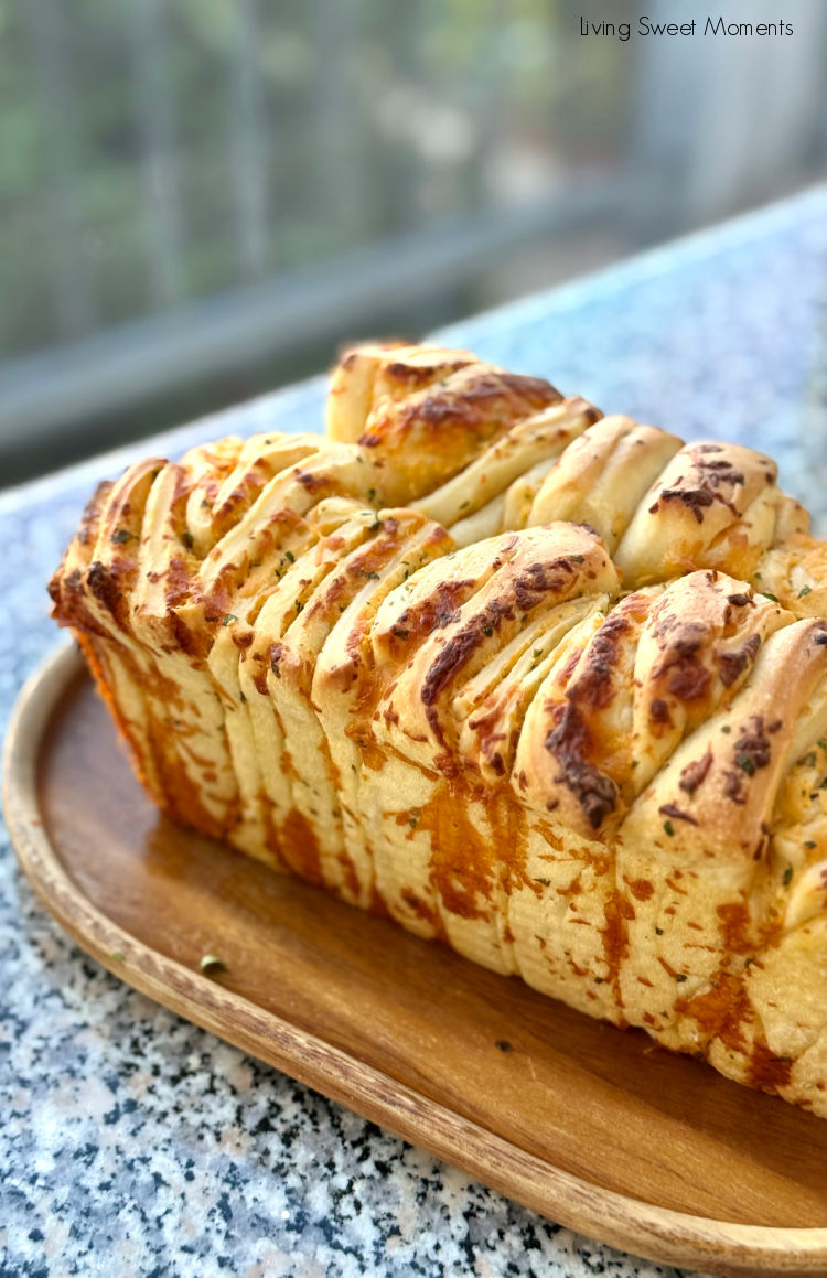 Soft, garlicky, cheesy sourdough pull-apart bread with golden layers, easy, cozy, and perfect for sharing or pairing with soups.